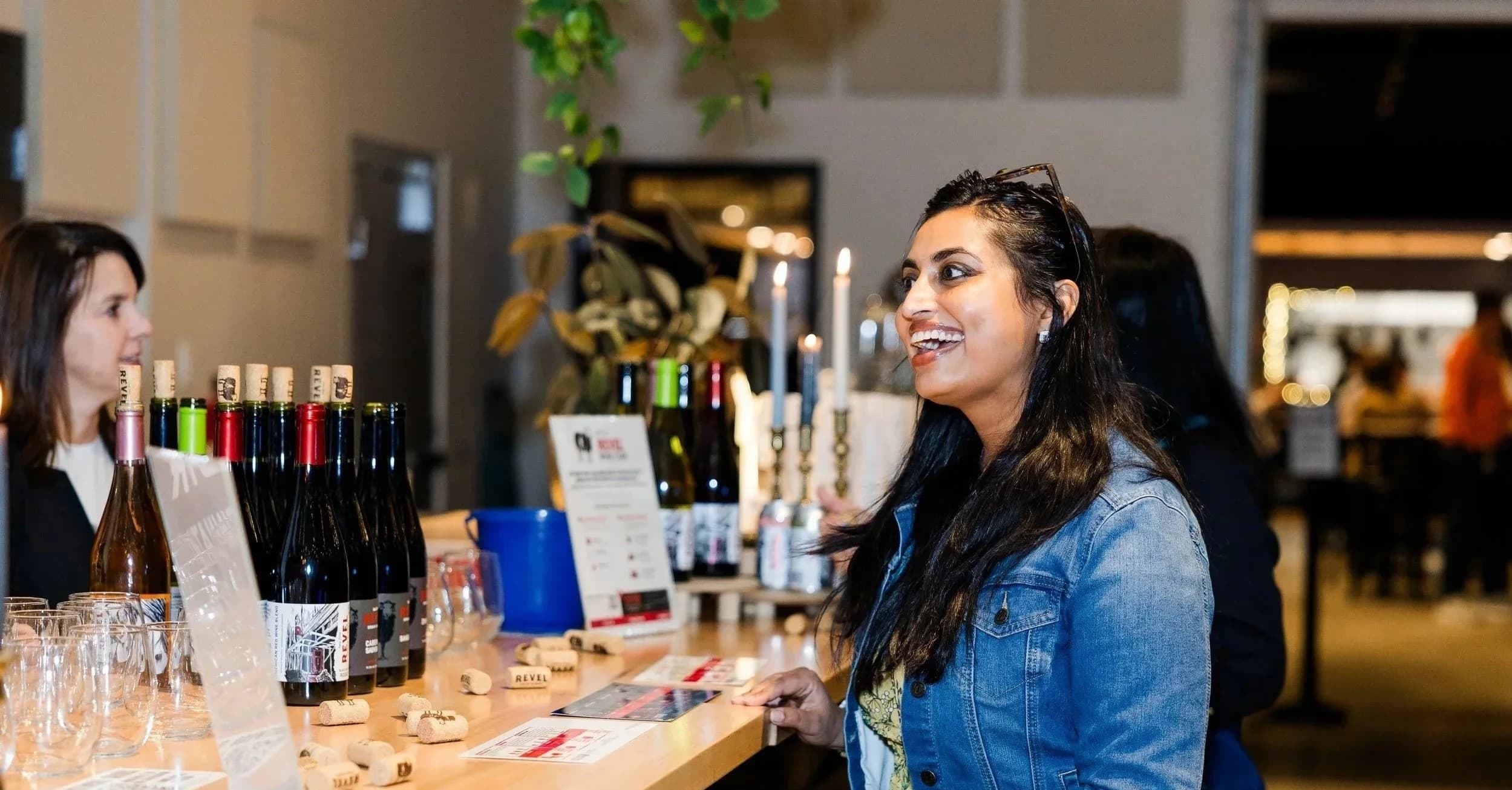 Guests mingling at the bar during a private event at HighGrain