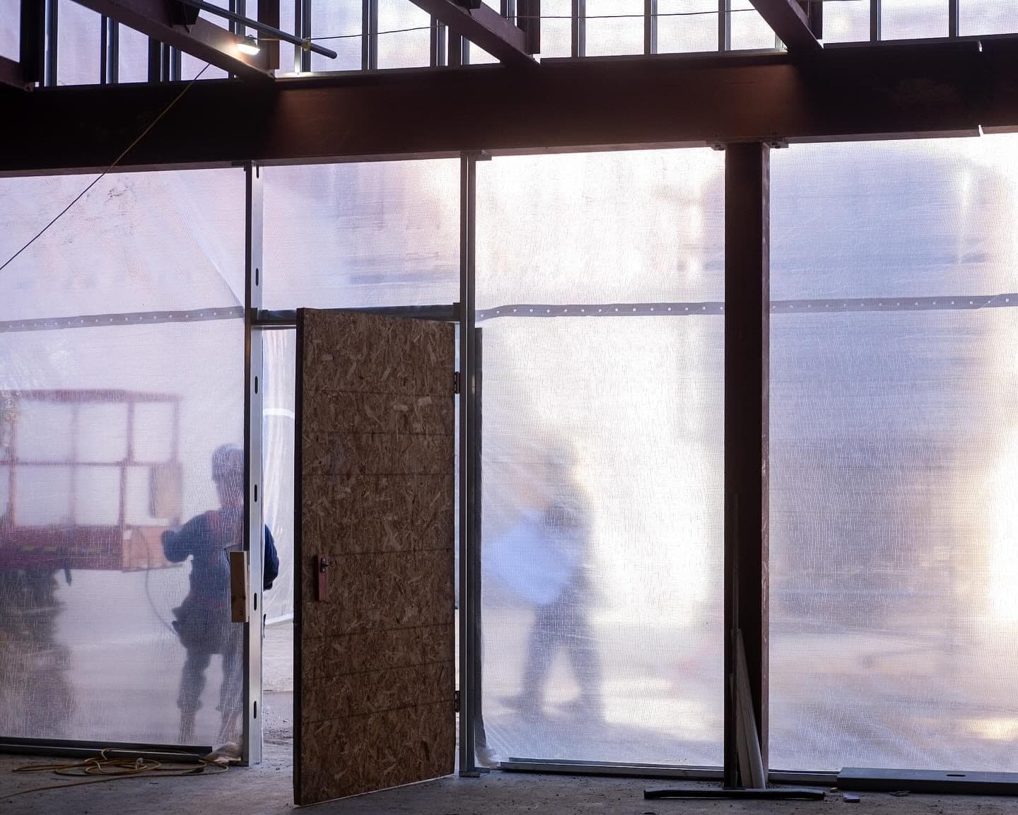 New glass doors being installed