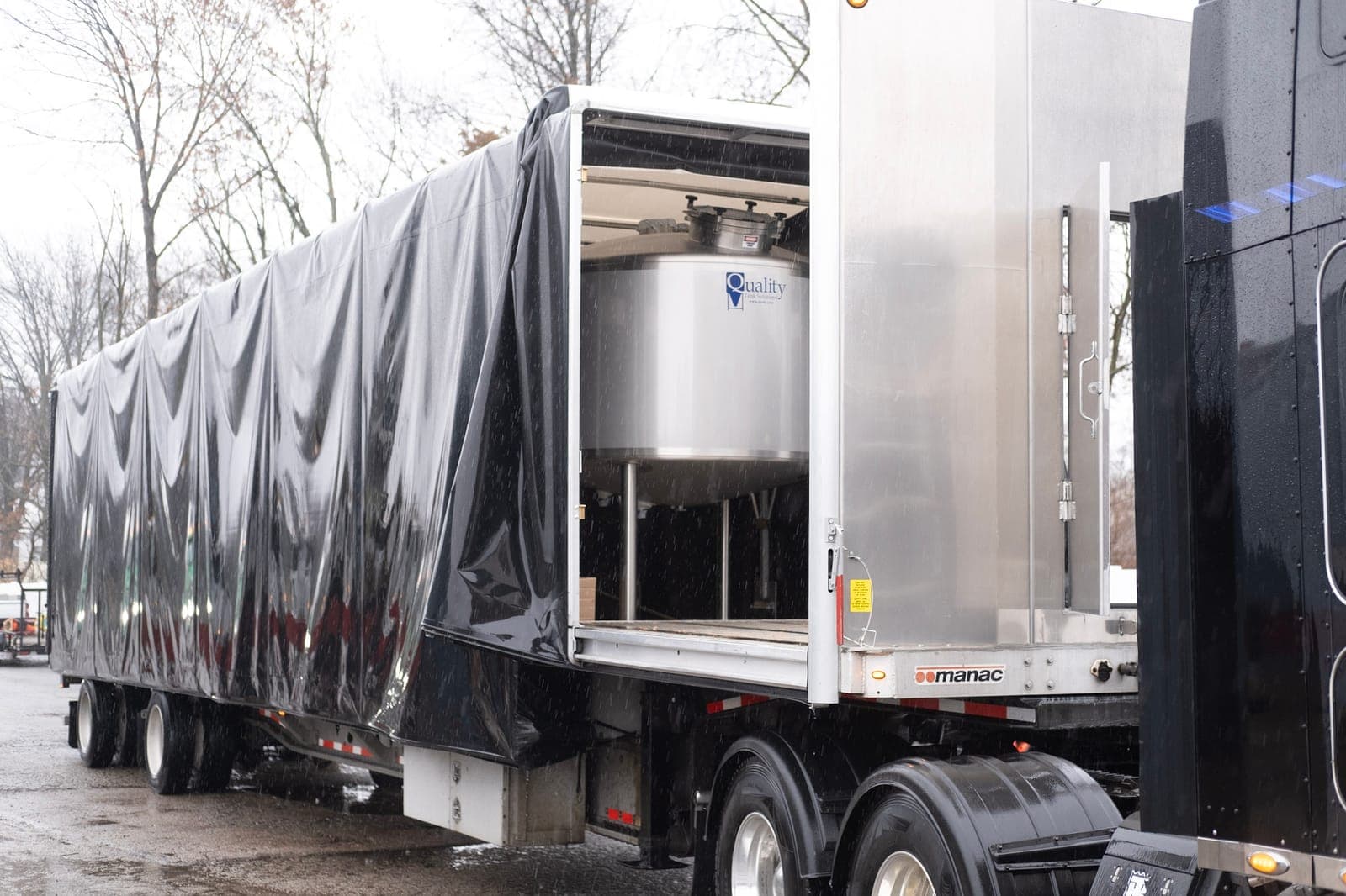 A brewhouse vessel arriving on a truck