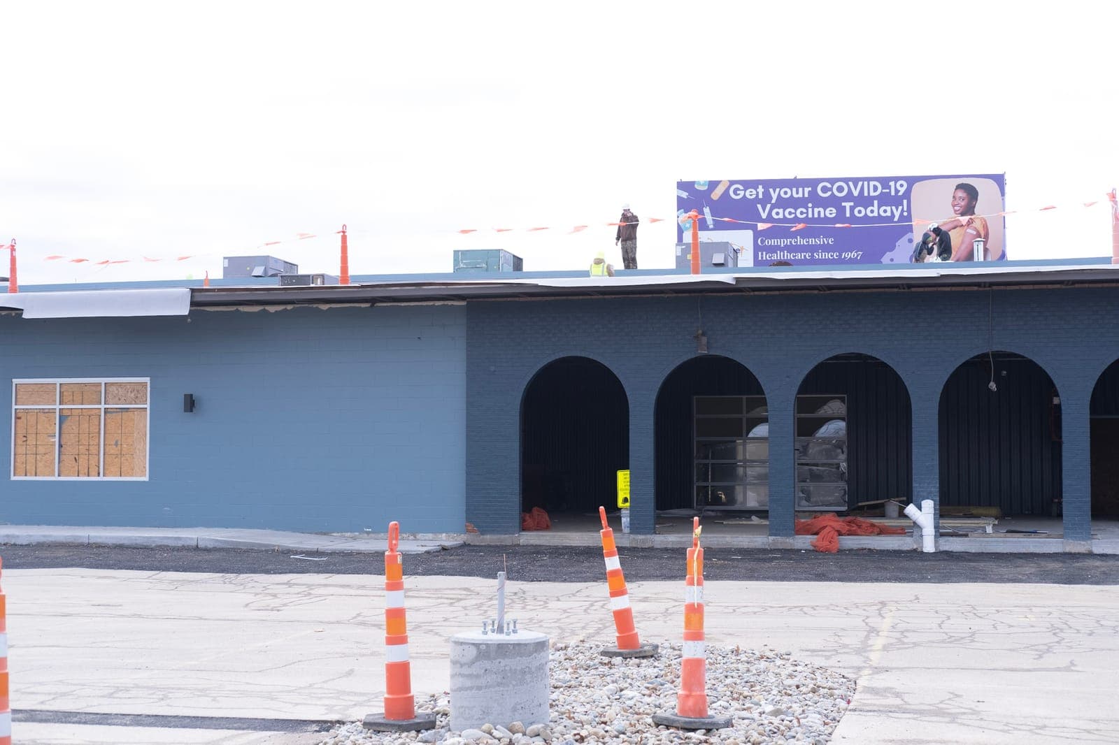 The arched front, painted blue, during site work
