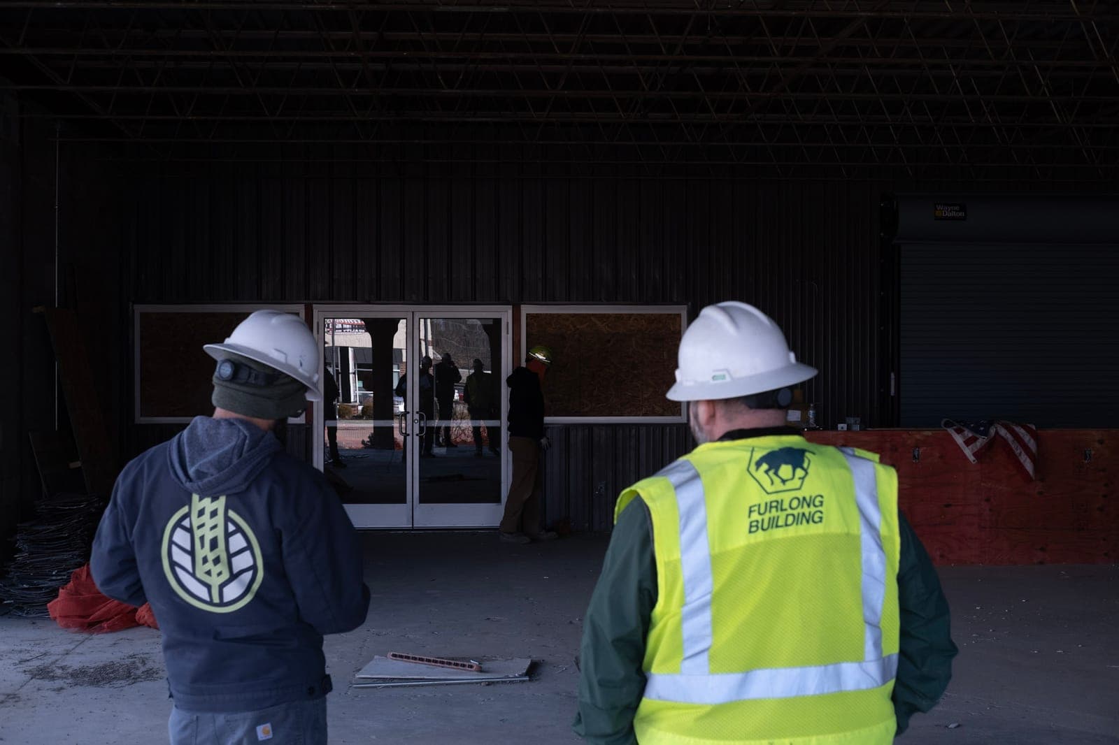 HighGrain and Furlong Building walking the site in hard hats
