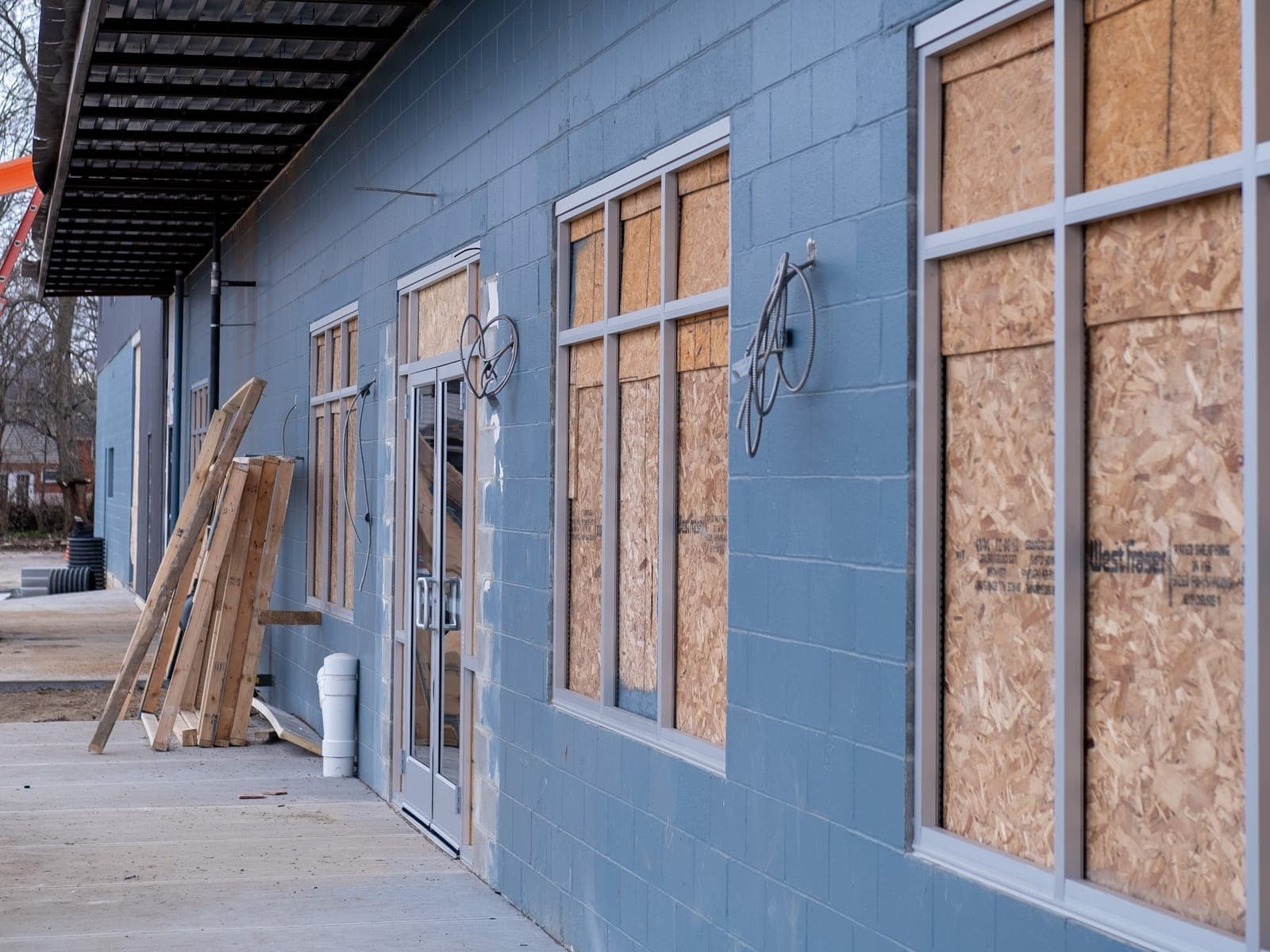 New window and door framing on the building's exterior