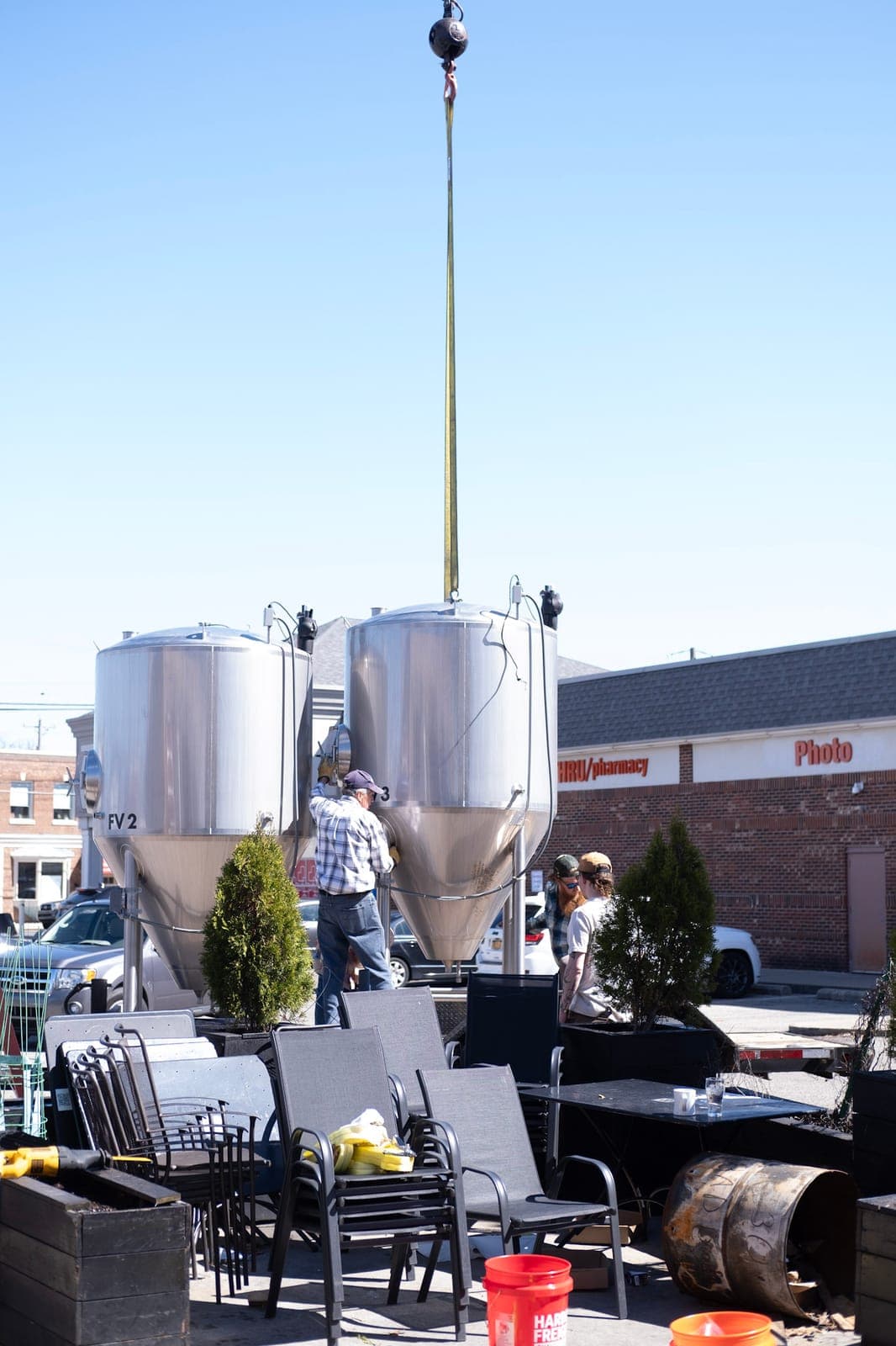 Fermenters craned out of the Silverton brewery for the move to Brentwood
