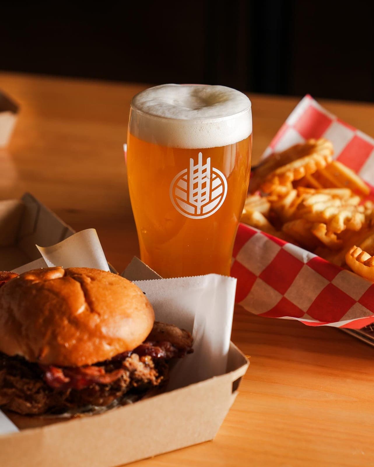 A burger, fries and a HighGrain beer from the opening menu