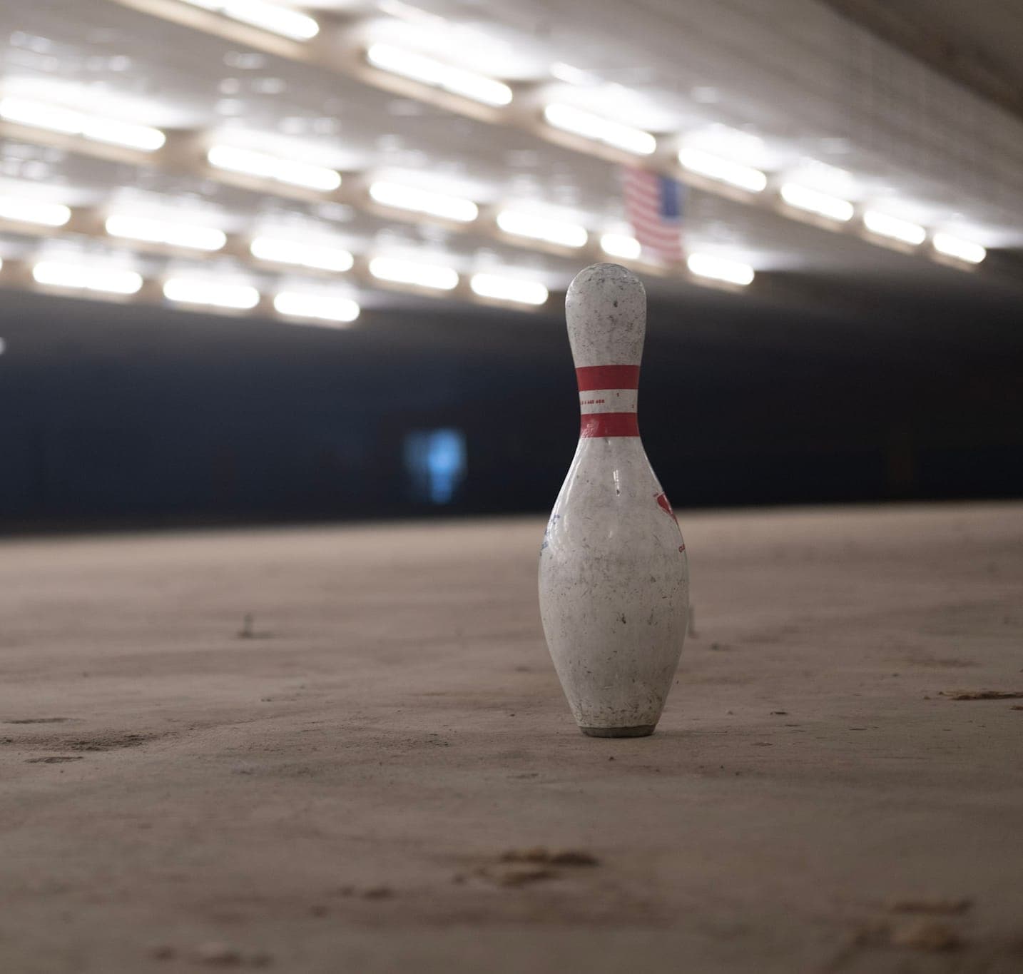 A lone bowling pin on the lanes of the old Brentwood Bowl, now HighGrain Brentwood